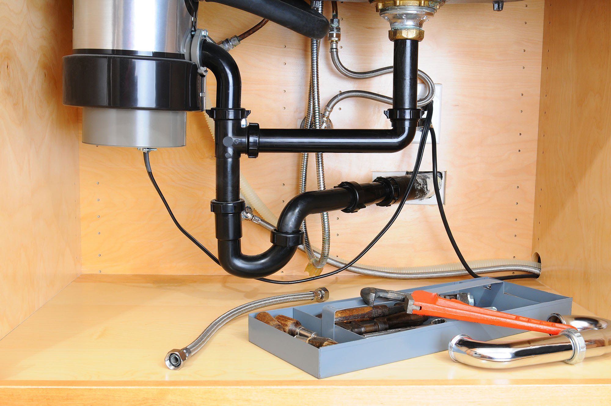 kitchen sink plumbing with disposal and dishwasher